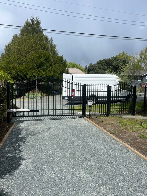 Custom iron gate installation